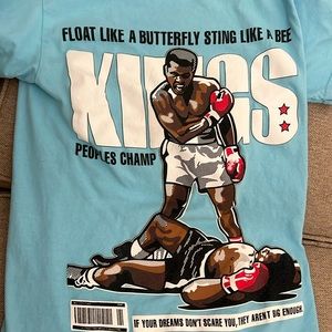 Light blue Ali t shirt size small. Shirt is in good condition.